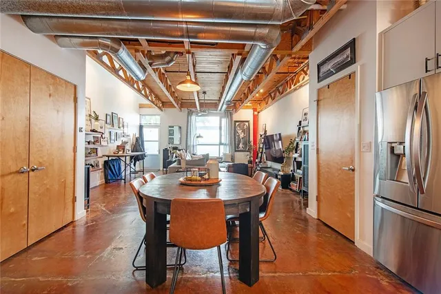 a view of a dining room with furniture