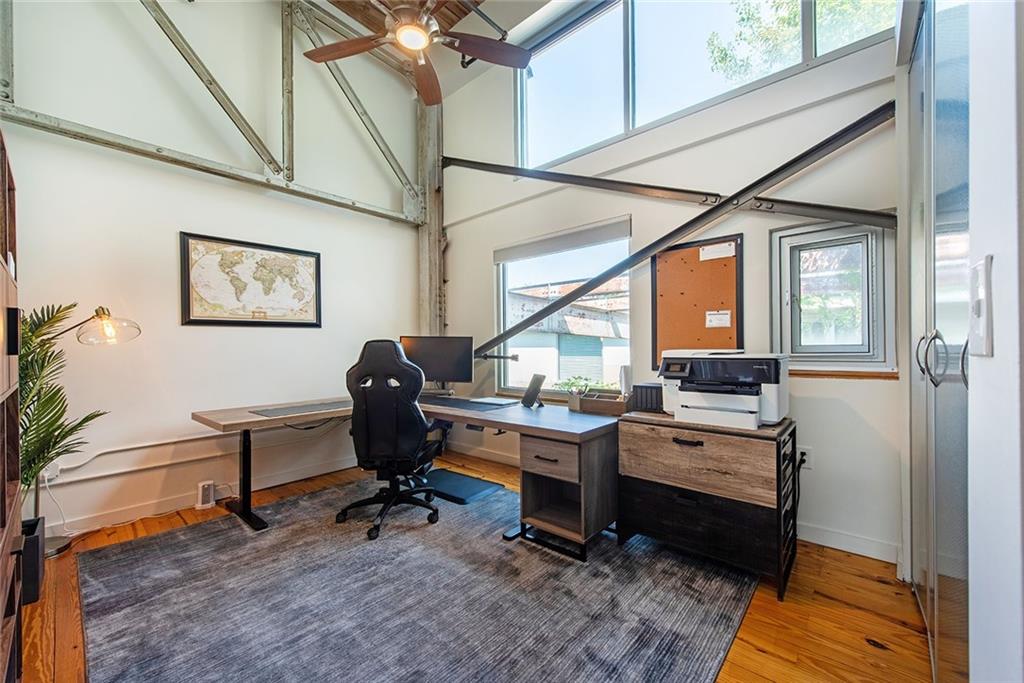 1661 La France Street Northeast, Unit 325 Atlanta, GA 30307 - Photo 30 of 40 a view of a workspace with furniture and a window