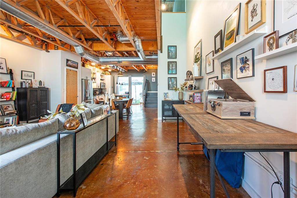 1661 La France Street Northeast, Unit 325 Atlanta, GA 30307 - Photo 6 of 40 a view of a living room and kitchen