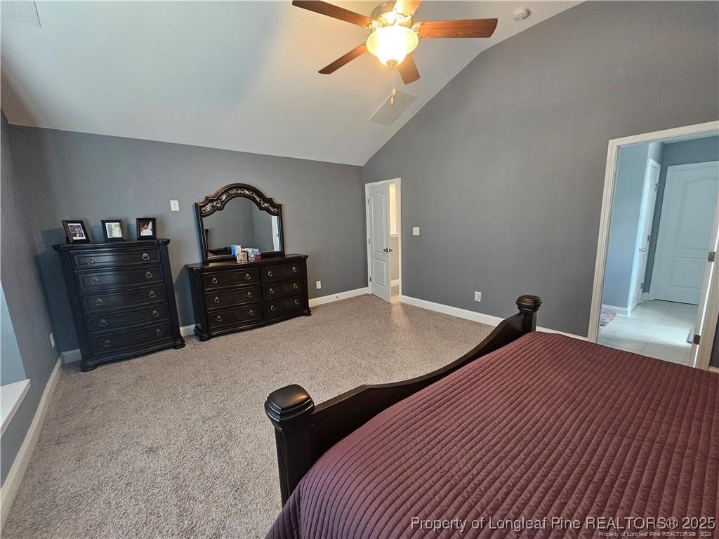 181 Pendleton Street Raeford, NC 28376 - Photo 10 of 19 a bed room with a bed and a television