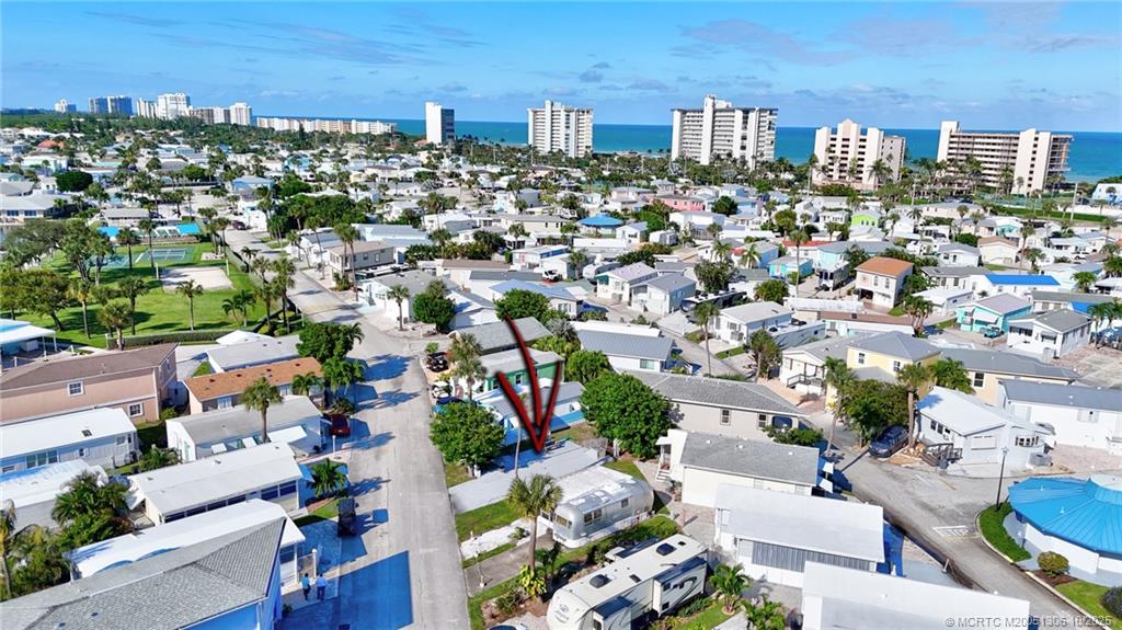 10725 South Ocean Drive, Unit 82 Jensen Beach, FL 34957 - Photo 4 of 13 an aerial view of city