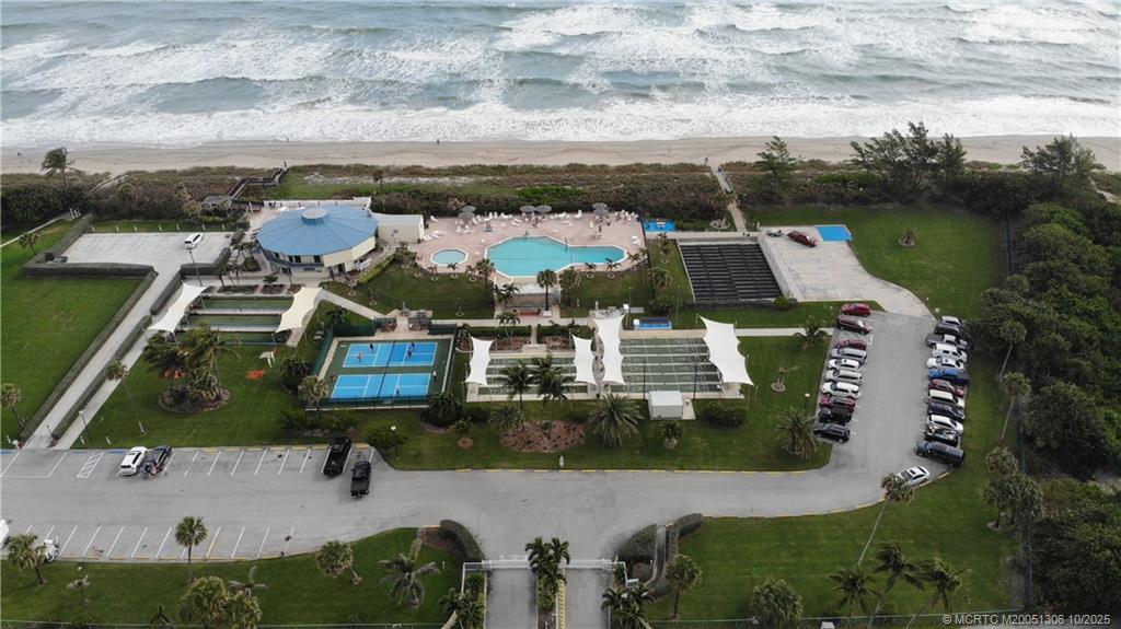 10725 South Ocean Drive, Unit 82 Jensen Beach, FL 34957 - Photo 9 of 13 an aerial view of houses with outdoor space