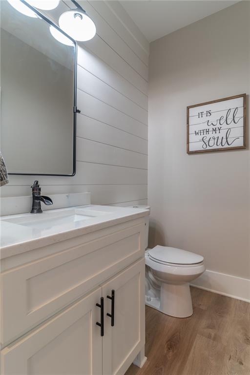 2250 Sperin Road Ball Ground, GA 30107 - Photo 22 of 56 a bathroom with a toilet sink and mirror