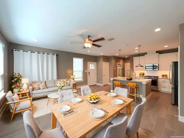a view of a dining room with furniture window and outside view