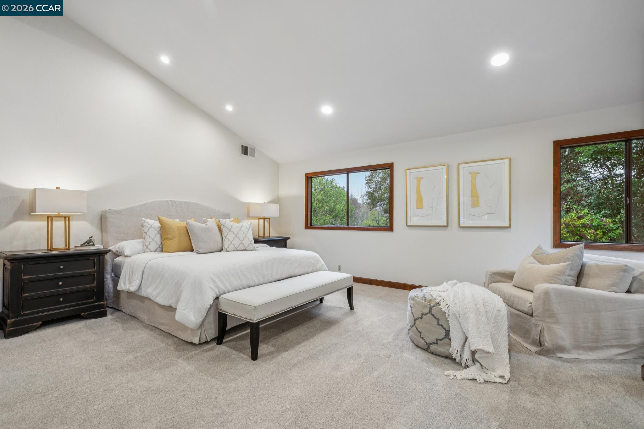 1324 A Martino Road Lafayette, CA 94549 - Photo 26 of 55 a spacious bedroom with a bed and a couch