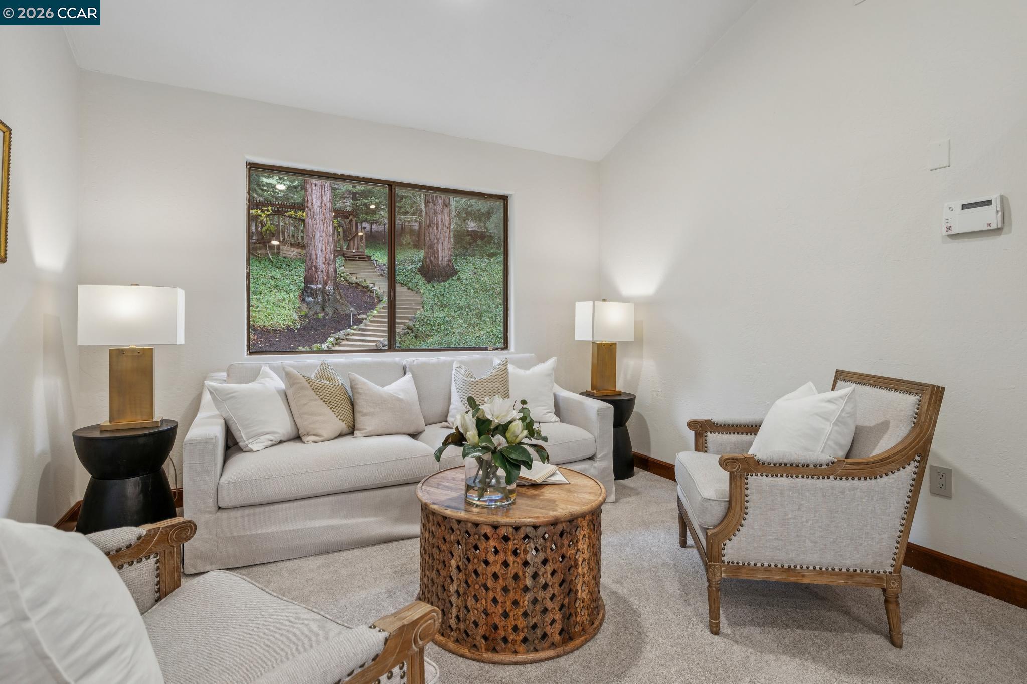 1324 A Martino Road Lafayette, CA 94549 - Photo 29 of 55 a living room with furniture and a large window