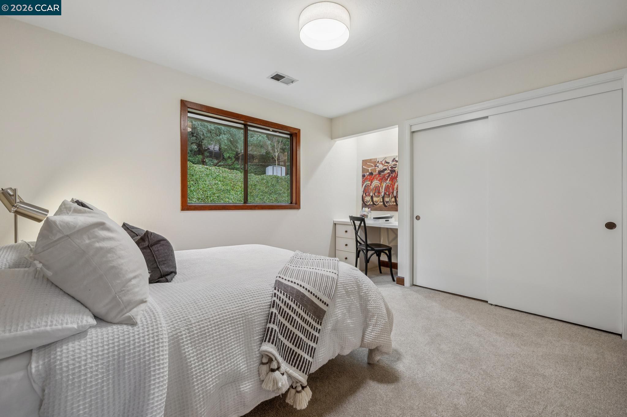 1324 A Martino Road Lafayette, CA 94549 - Photo 34 of 55 a bedroom with a bed and a window