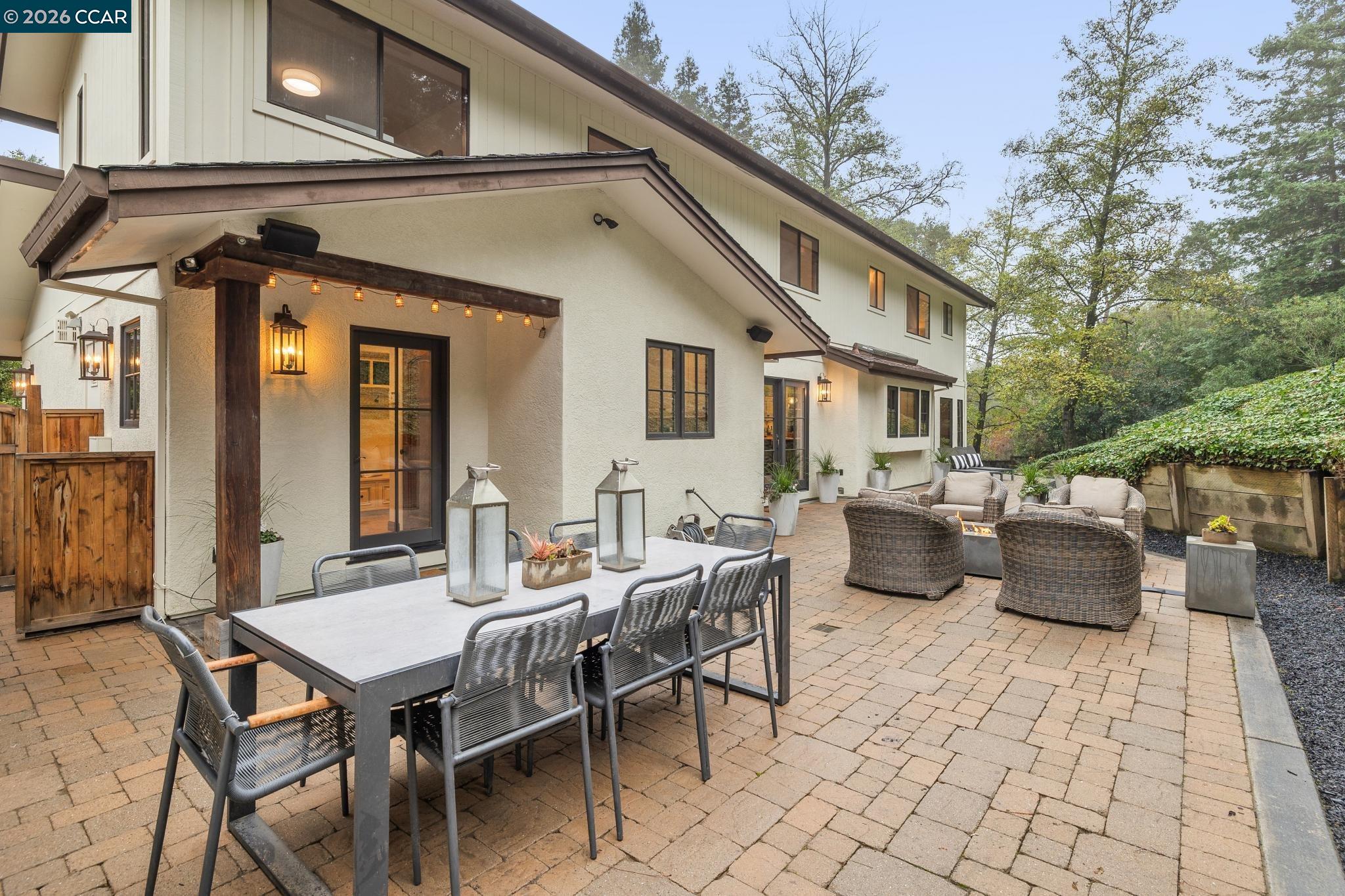 1324 A Martino Road Lafayette, CA 94549 - Photo 41 of 55 a view of a patio with table and chairs and potted plants