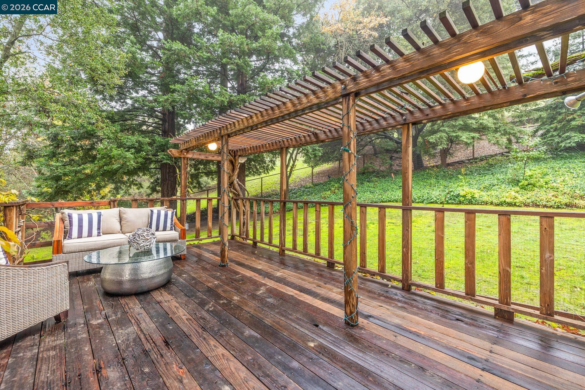 1324 A Martino Road Lafayette, CA 94549 - Photo 47 of 55 a balcony with furniture and wooden floor