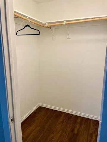 a view of small space with racks on the wall