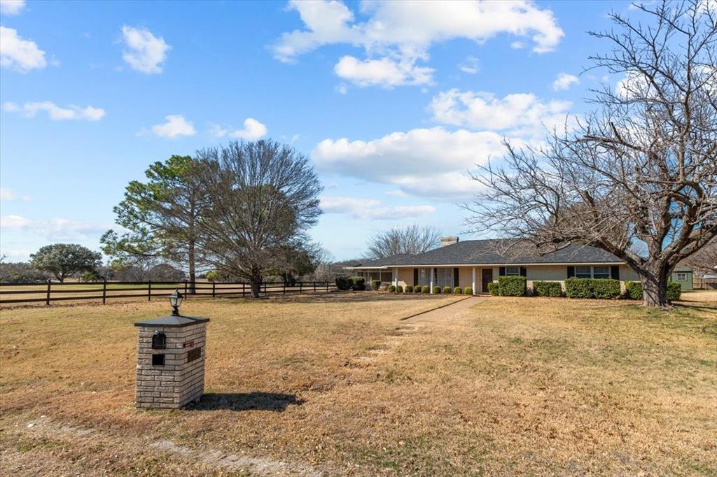 9313 Tree Lake Drive Waco, TX 76708 - Photo 2 of 35 a view of a lake with houses