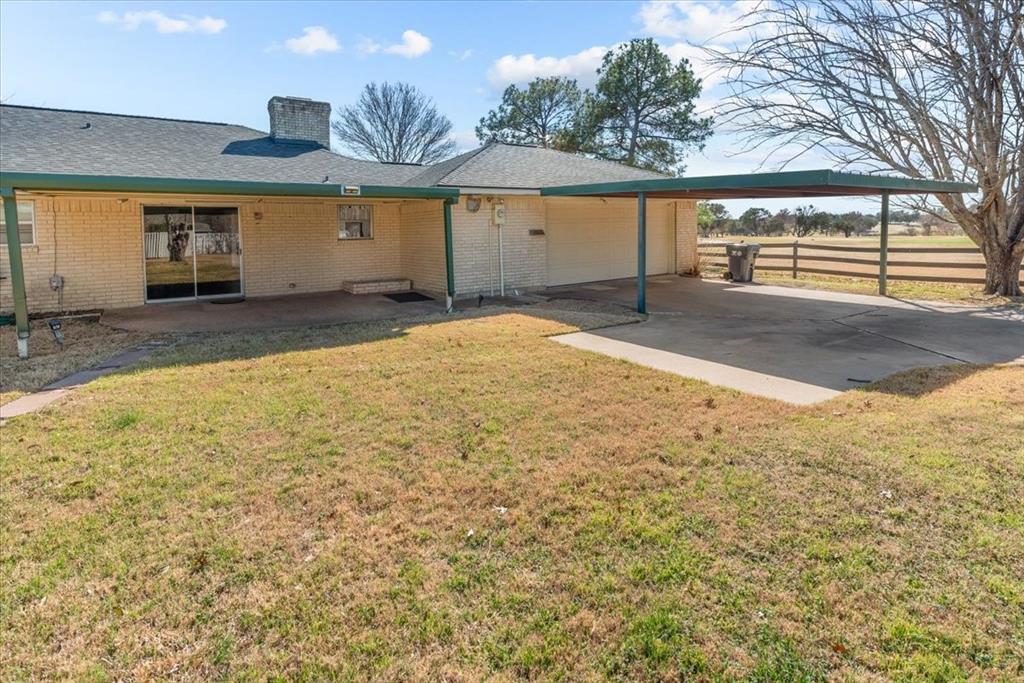 9313 Tree Lake Drive Waco, TX 76708 - Photo 26 of 35 a view of a backyard of a house