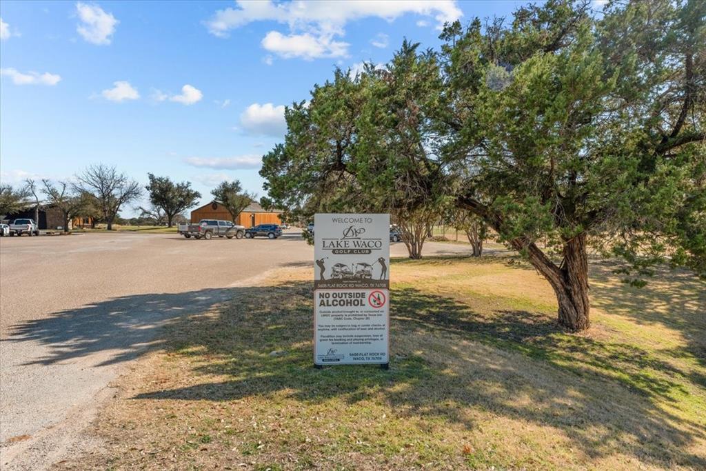 9313 Tree Lake Drive Waco, TX 76708 - Photo 30 of 35 a view of a yard with large trees