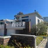 a view of balcony with furniture