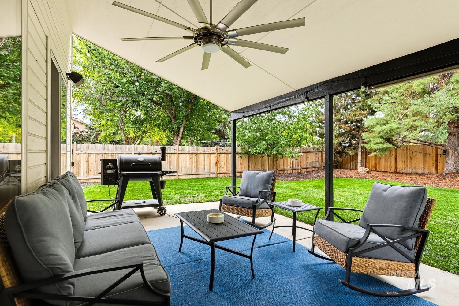 369 South Winthrop Way Boise, ID 83709 - Photo 38 of 50 Covered patio featuring a large ceiling fan and string lighting