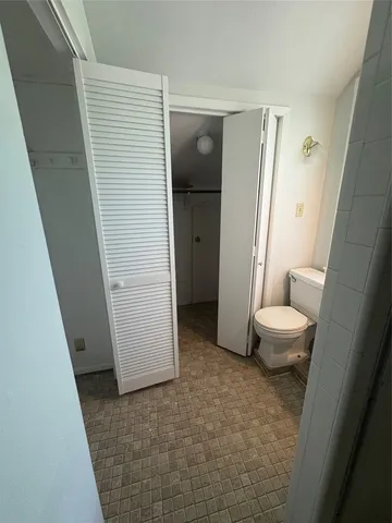 a view of outdoor space with wooden floor