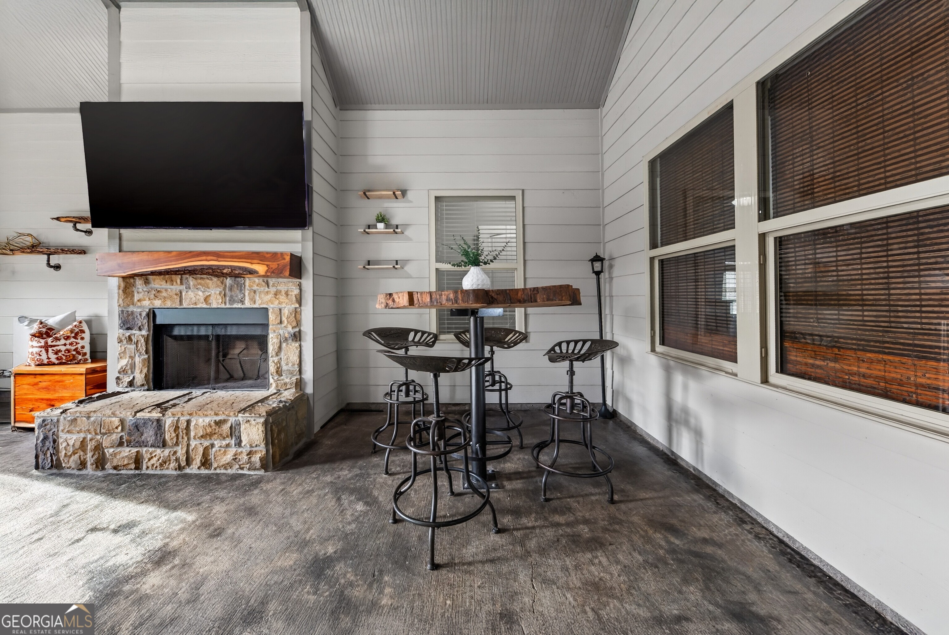 4772 Fairways Lane Jefferson, GA 30549 - Photo 12 of 56 a living room with furniture and a flat screen tv