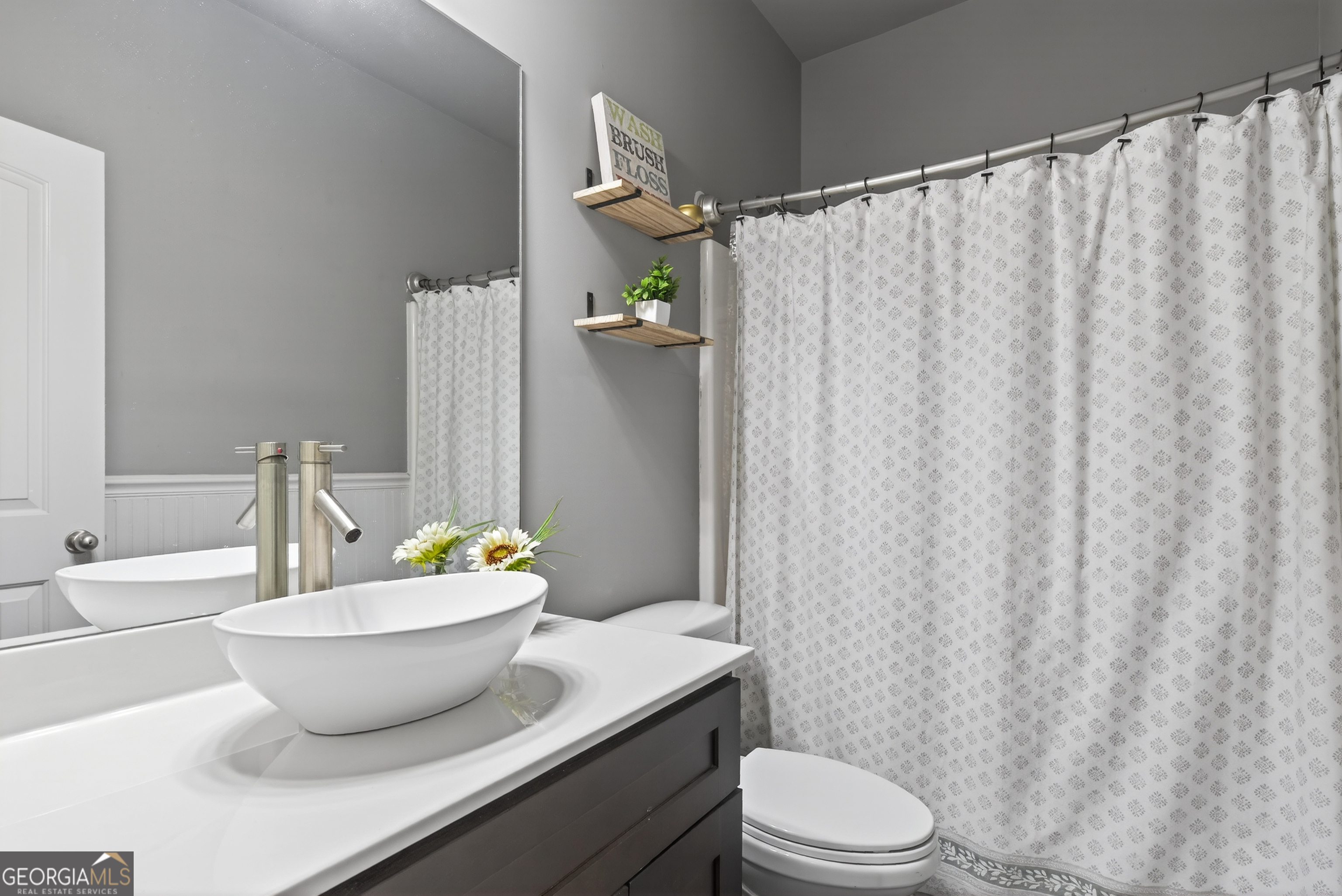 4772 Fairways Lane Jefferson, GA 30549 - Photo 19 of 56 a bathroom with a sink toilet and shower