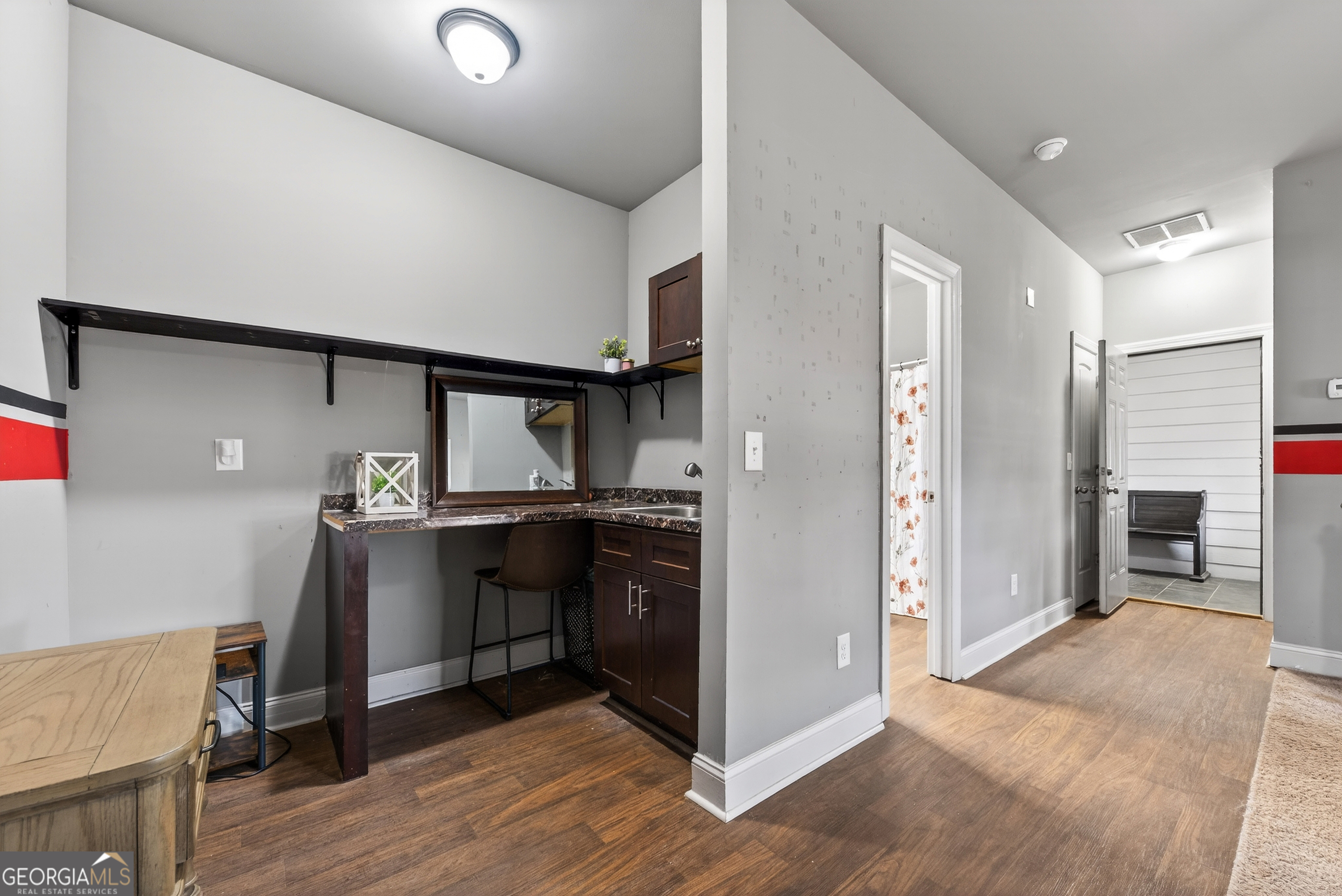 4772 Fairways Lane Jefferson, GA 30549 - Photo 22 of 56 a view of a kitchen with cabinets and wooden floor