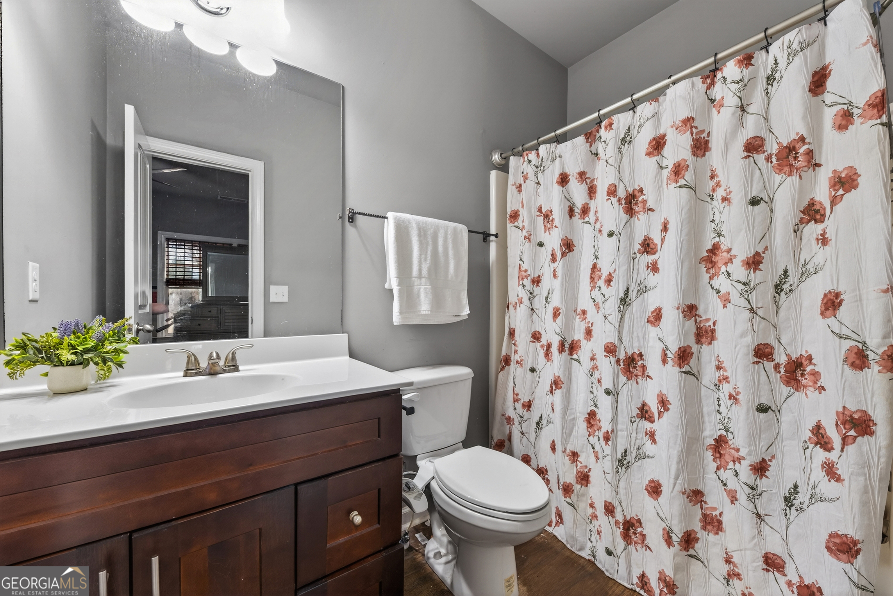4772 Fairways Lane Jefferson, GA 30549 - Photo 23 of 56 a bathroom with a sink toilet and shower