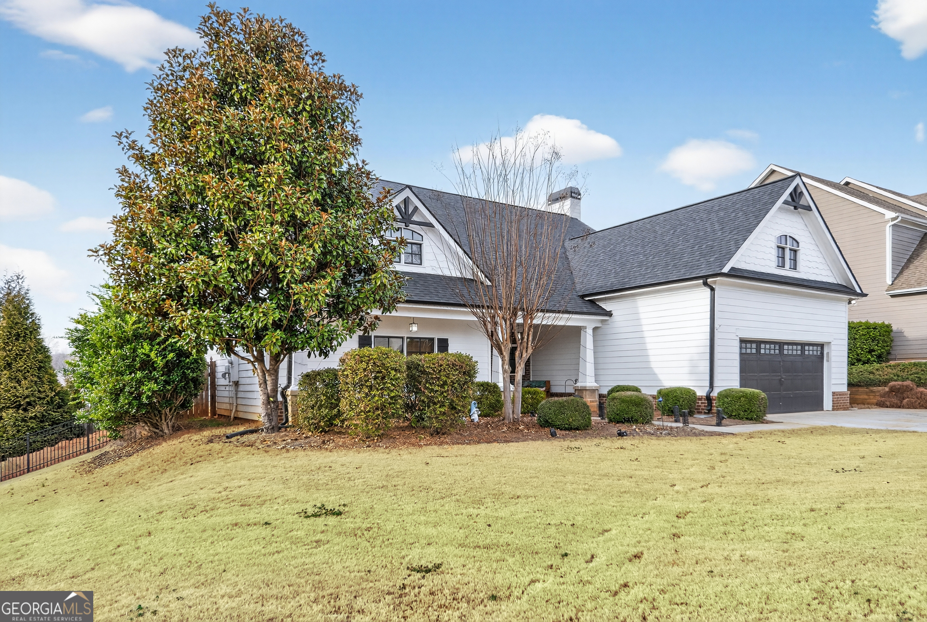 4772 Fairways Lane Jefferson, GA 30549 - Photo 25 of 56 a front view of a house with garden