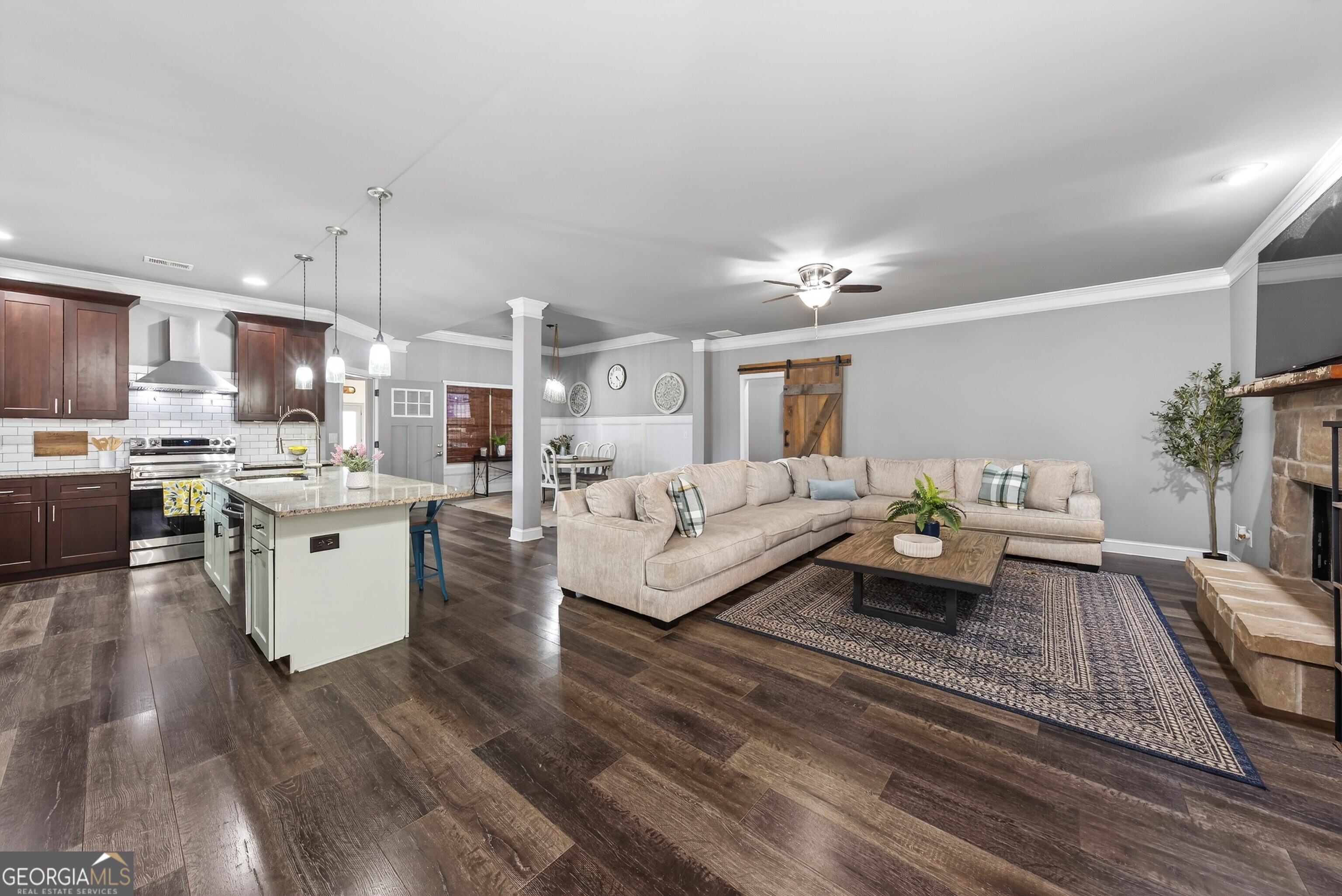 4772 Fairways Lane Jefferson, GA 30549 - Photo 30 of 56 a living room with furniture and kitchen view