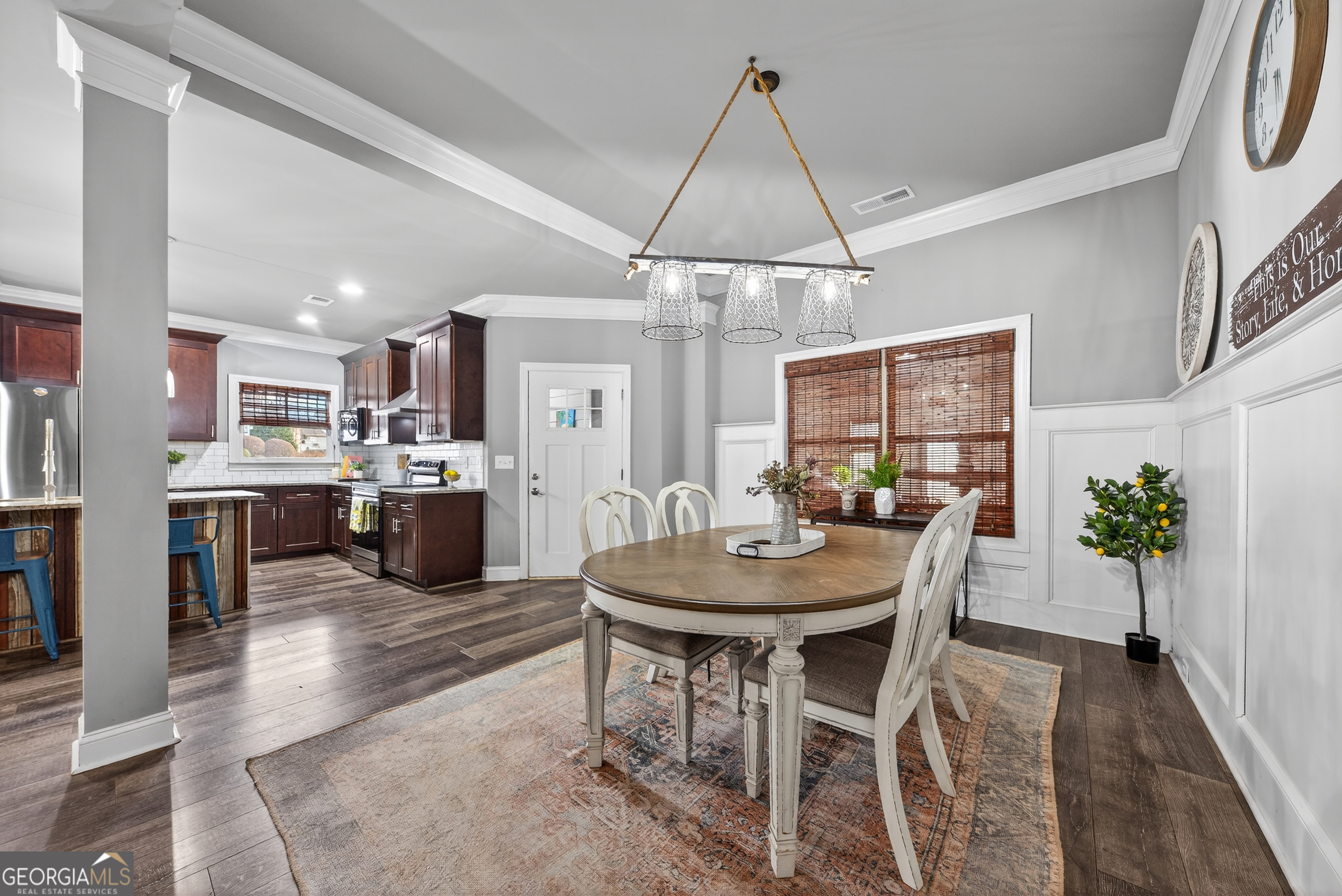4772 Fairways Lane Jefferson, GA 30549 - Photo 35 of 56 a view of a dining room with furniture and chandelier