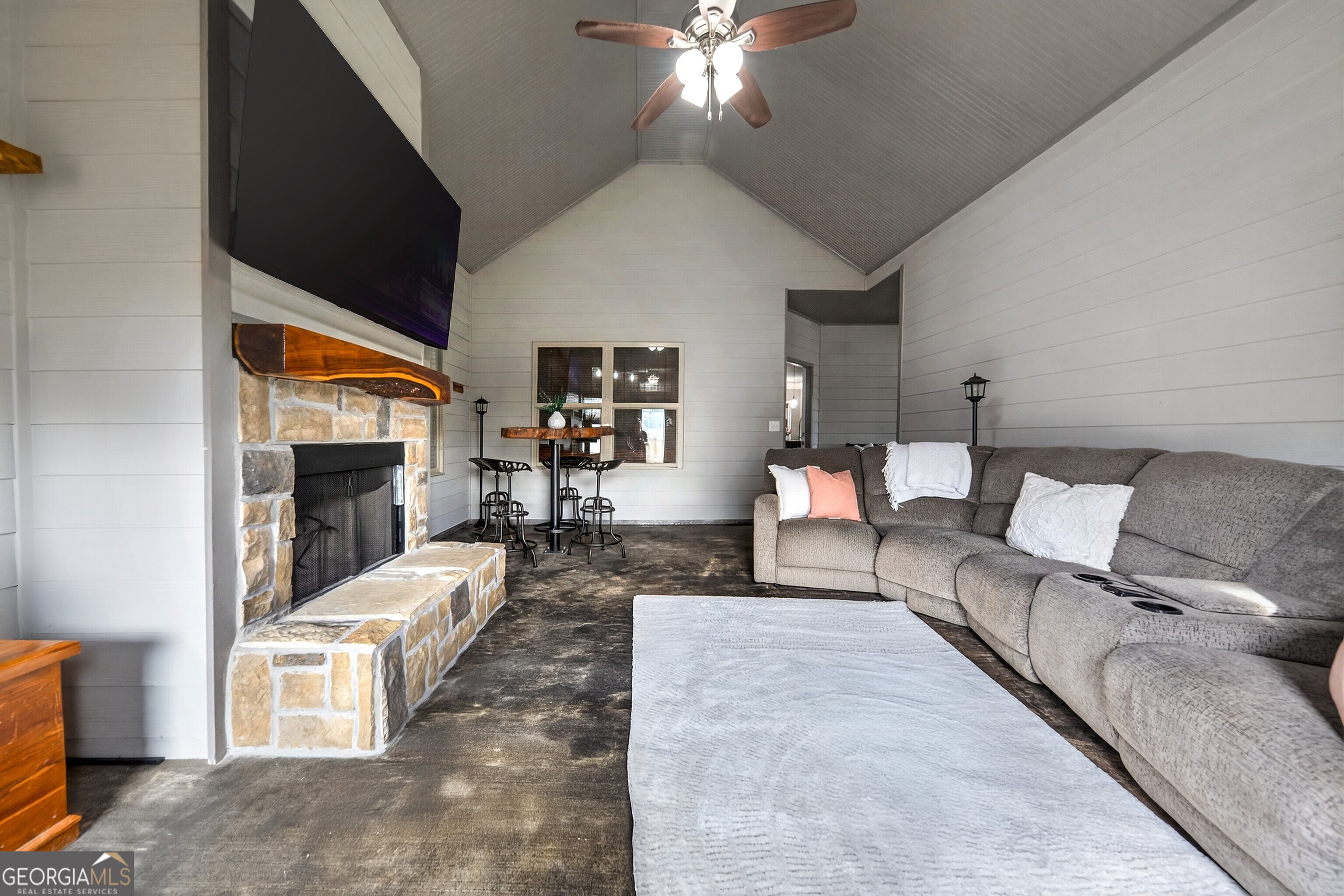 4772 Fairways Lane Jefferson, GA 30549 - Photo 36 of 56 a living room with furniture and a chandelier
