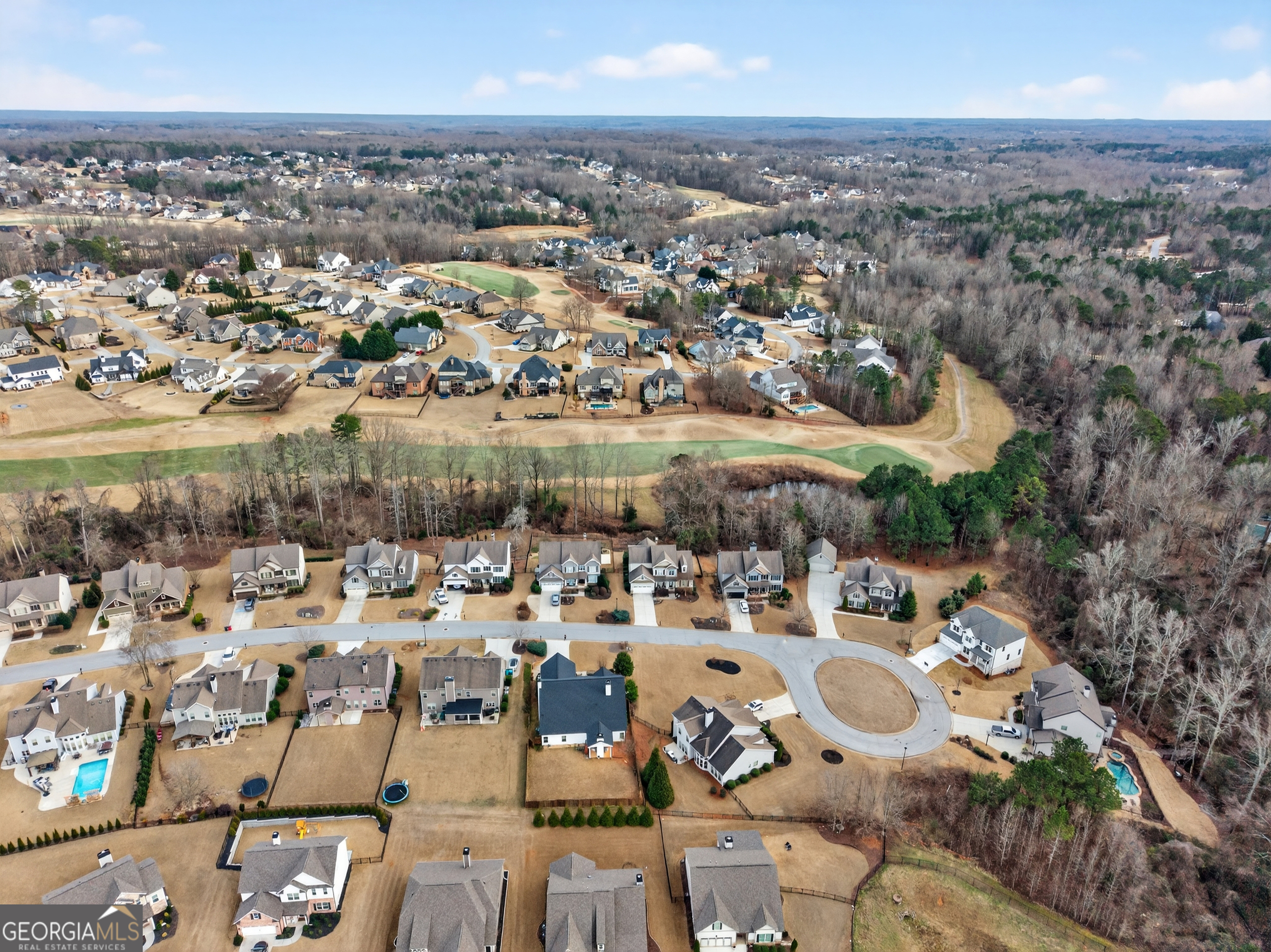 4772 Fairways Lane Jefferson, GA 30549 - Photo 49 of 56 an aerial view of a city with lots of residential buildings