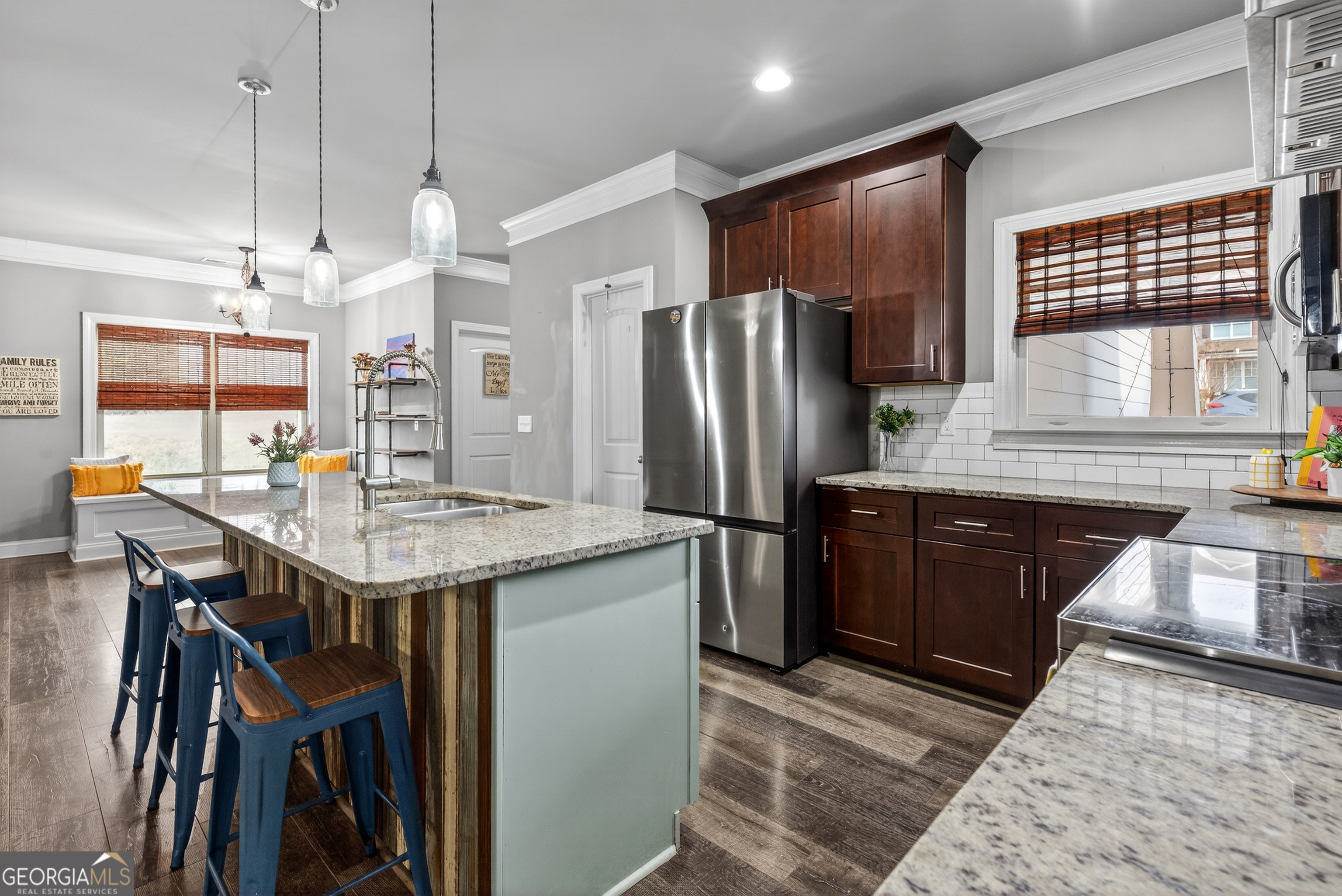 4772 Fairways Lane Jefferson, GA 30549 - Photo 9 of 56 a kitchen with stainless steel appliances granite countertop a sink a stove and a refrigerator