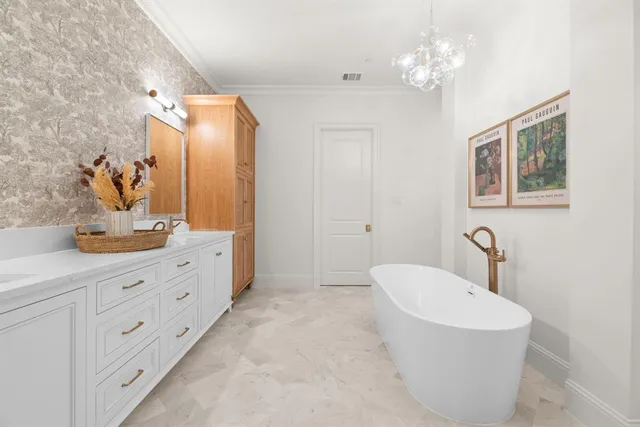 a bathroom with a granite countertop sink a toilet a mirror and shower