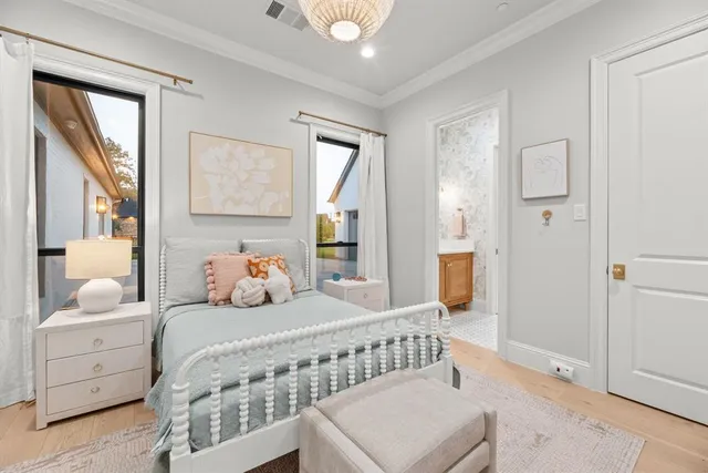 a view of a dining room with furniture wooden floor and chandelier