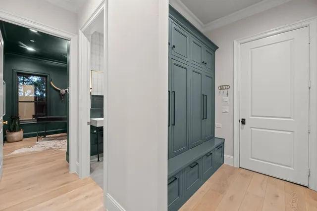 a living room with furniture a rug and a window