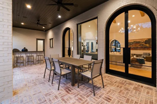 a view of a house with yard and a garden