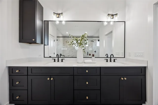 a bathroom with a shower and a bathtub