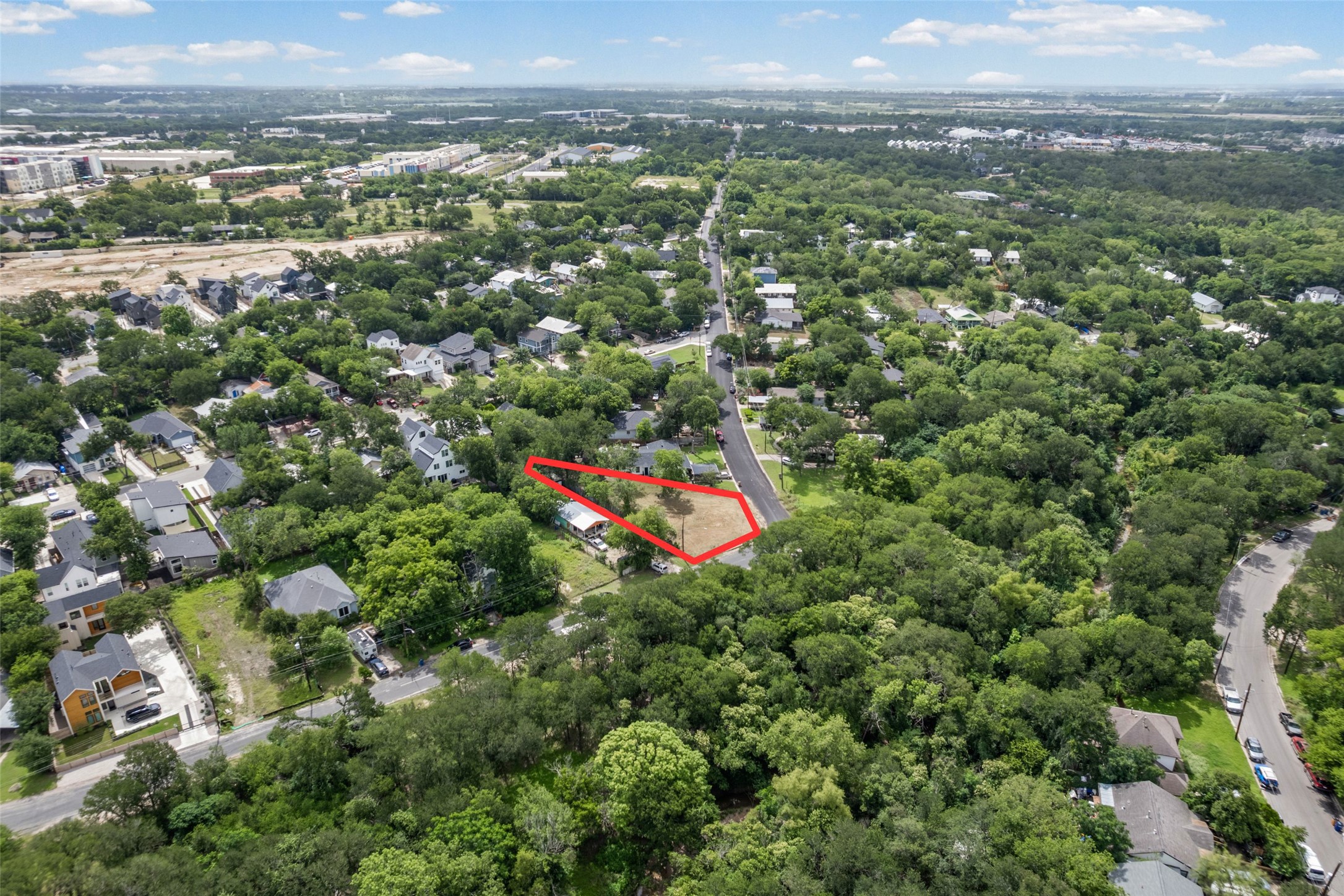 1201 Fort Branch Boulevard Austin, TX 78721 - Photo 3 of 19 A spacious, naturally illuminated lot nestled in a verdant, established neighborhood.