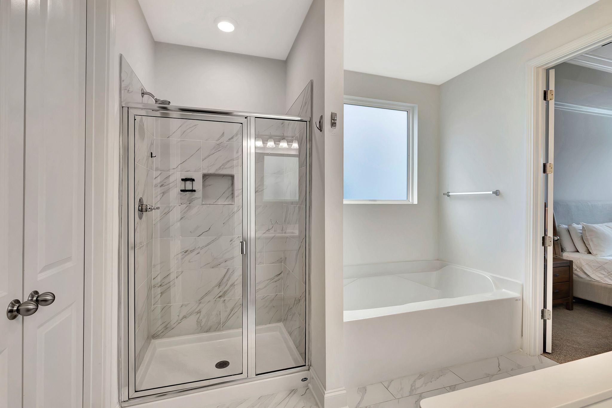 3017 Shandor St Spring Hill Spring Hill, TN 37174 - Photo 24 of 46 a bathroom with a bathtub and a shower