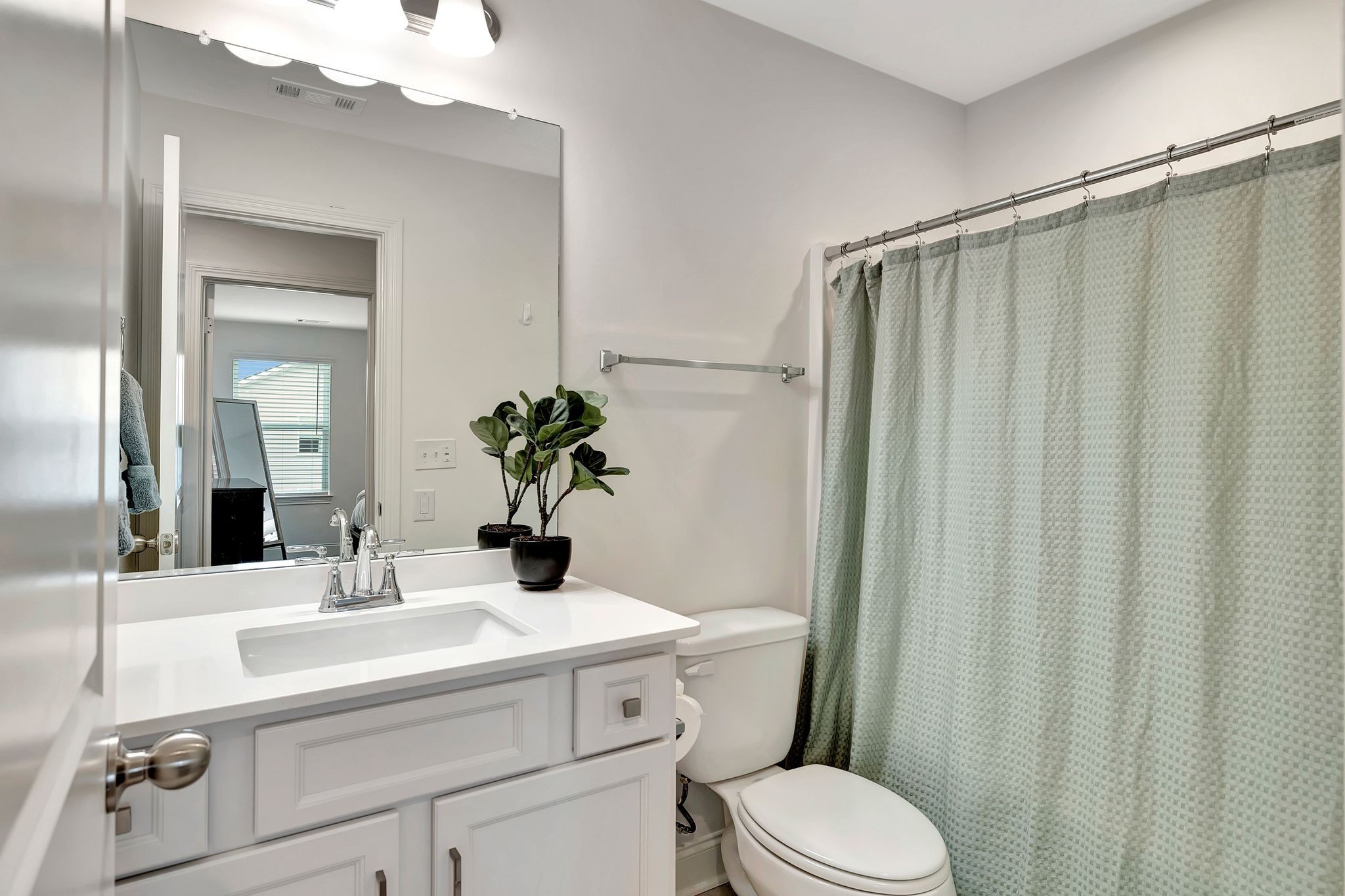 3017 Shandor St Spring Hill Spring Hill, TN 37174 - Photo 25 of 46 a bathroom with a sink a mirror and a toilet