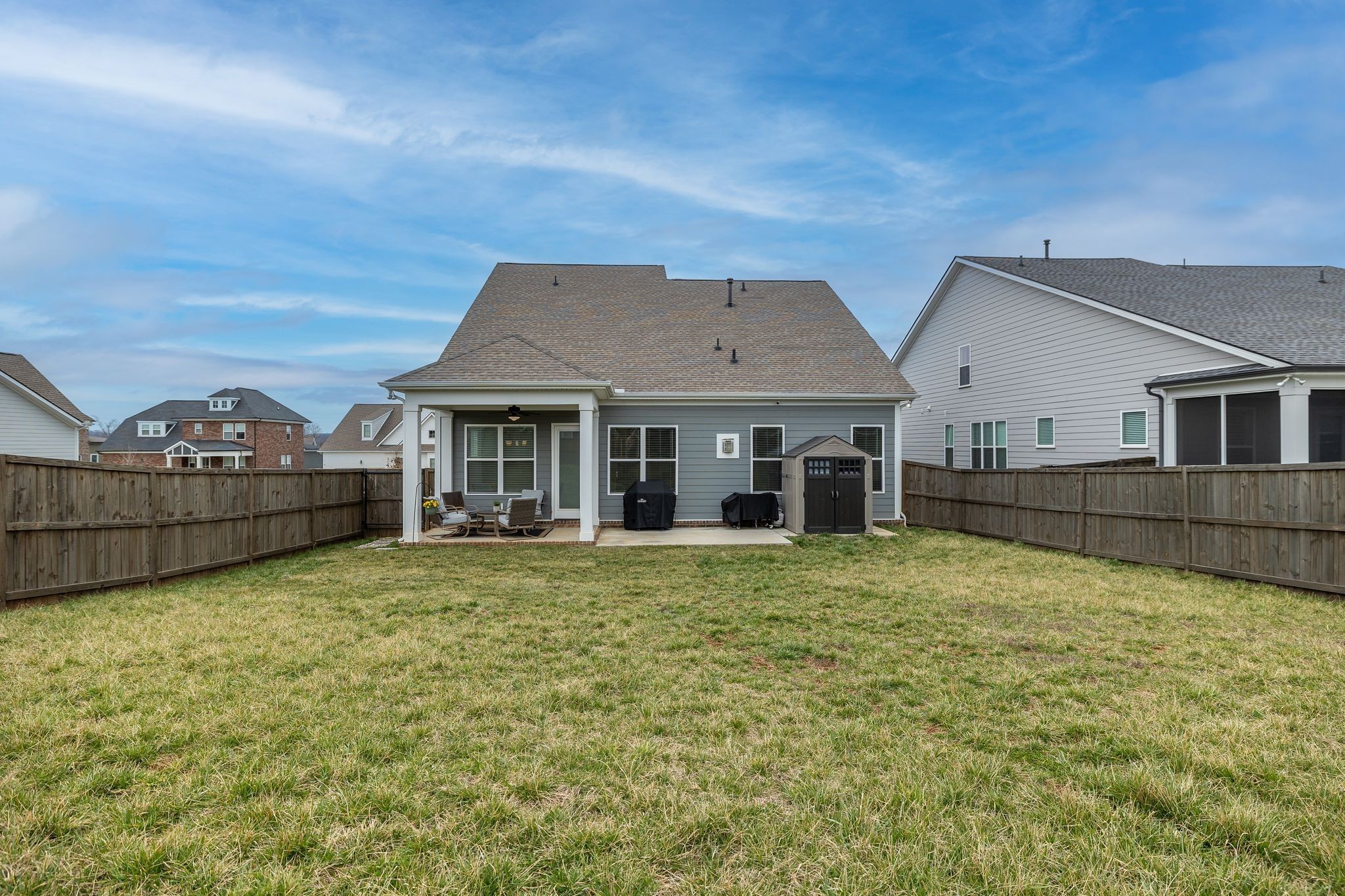 3017 Shandor St Spring Hill Spring Hill, TN 37174 - Photo 33 of 46 a view of a house with backyard and garden