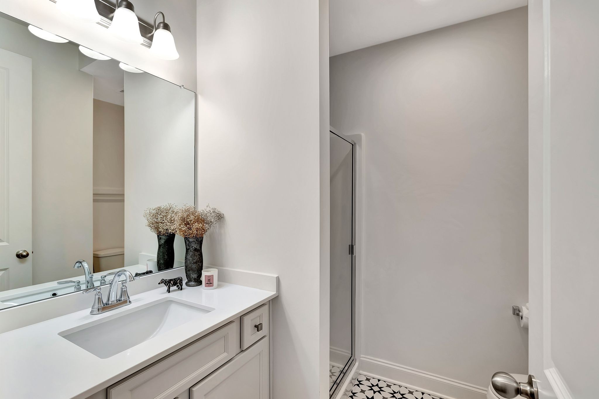 3017 Shandor St Spring Hill Spring Hill, TN 37174 - Photo 7 of 46 a bathroom with a sink and a mirror