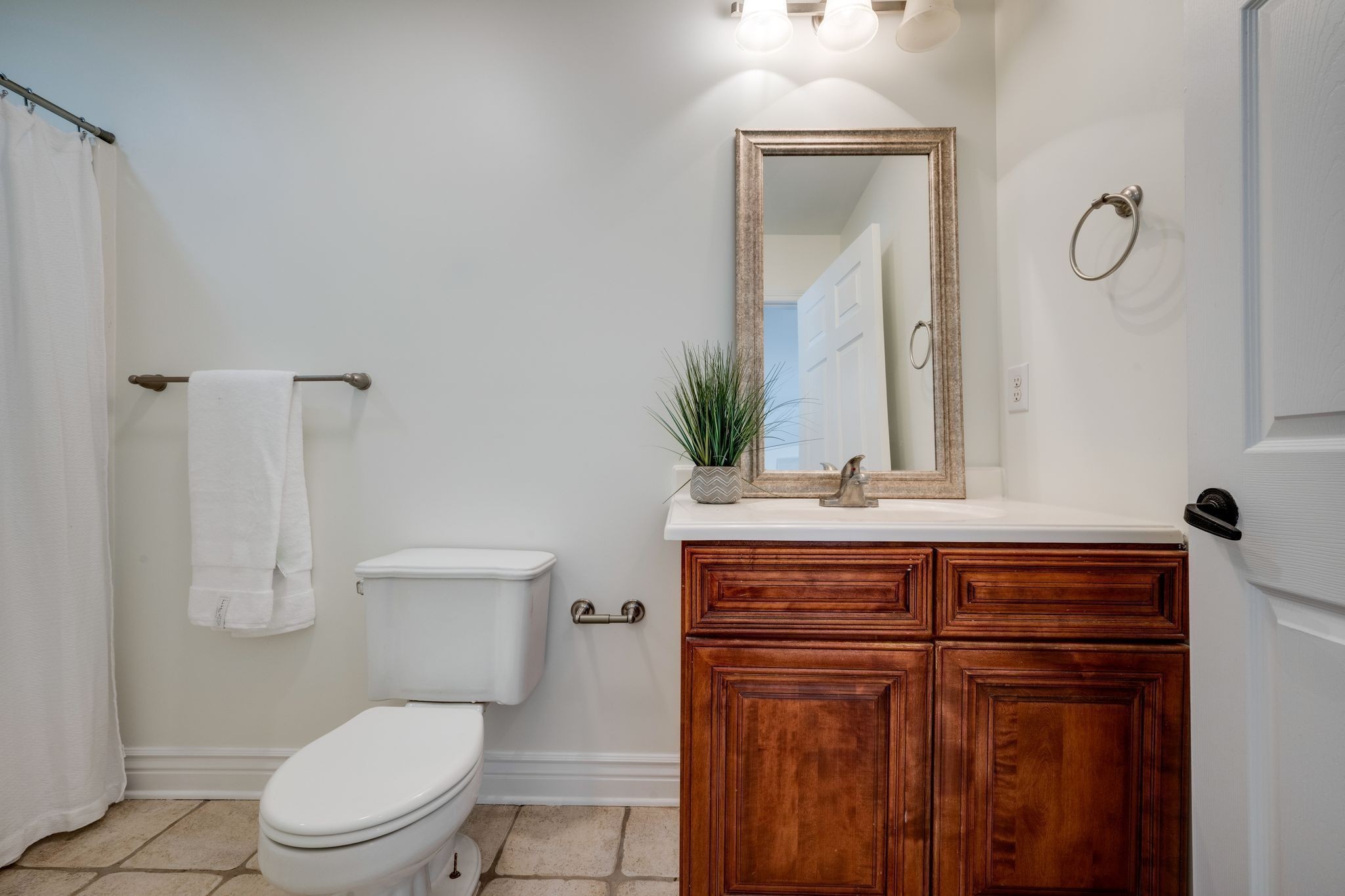 264 Fire Tower Road Dickson, TN 37055 - Photo 26 of 48 a bathroom with a toilet a sink and mirror