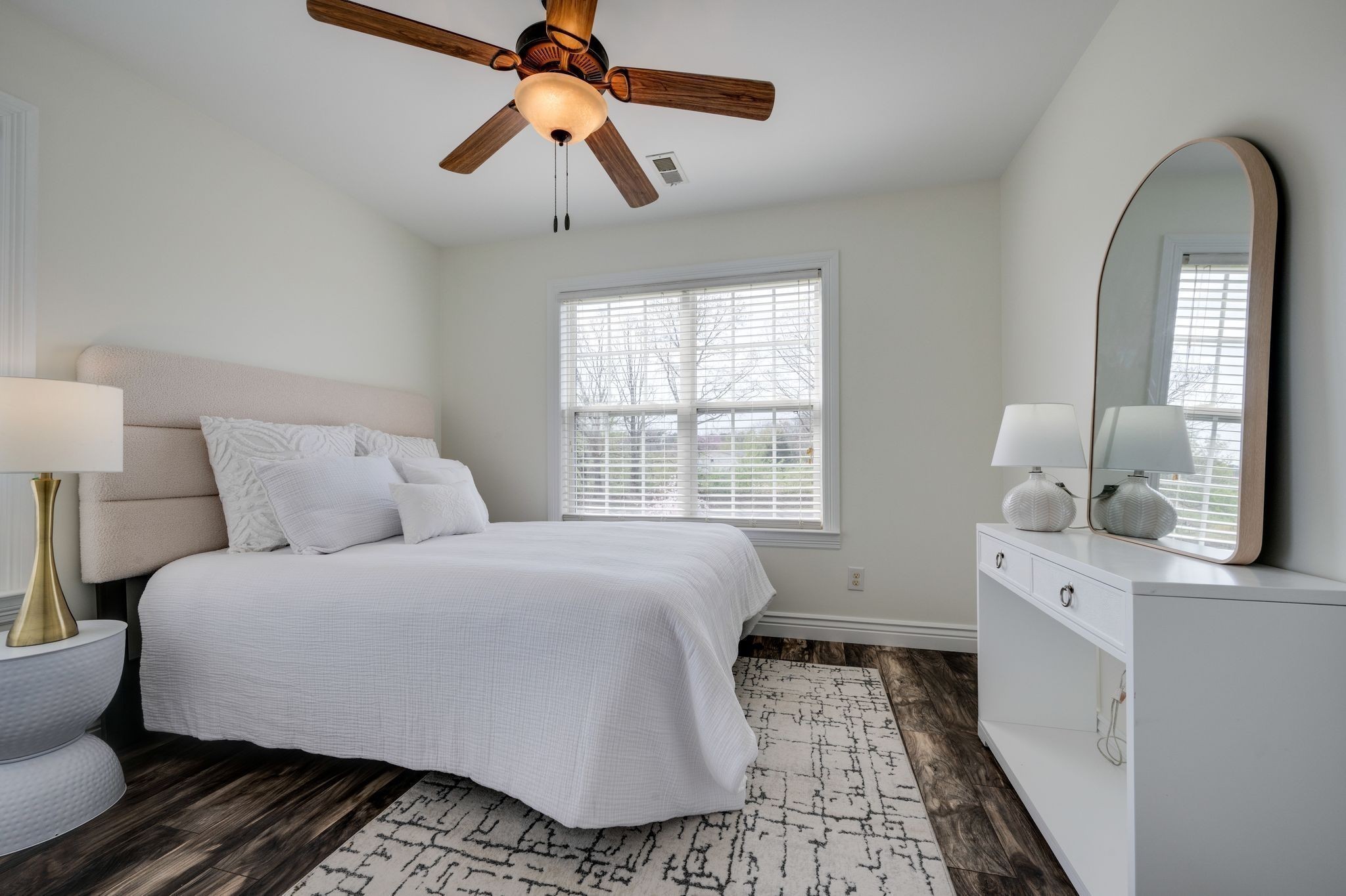 264 Fire Tower Road Dickson, TN 37055 - Photo 27 of 48 a bedroom with a bed and a mirror