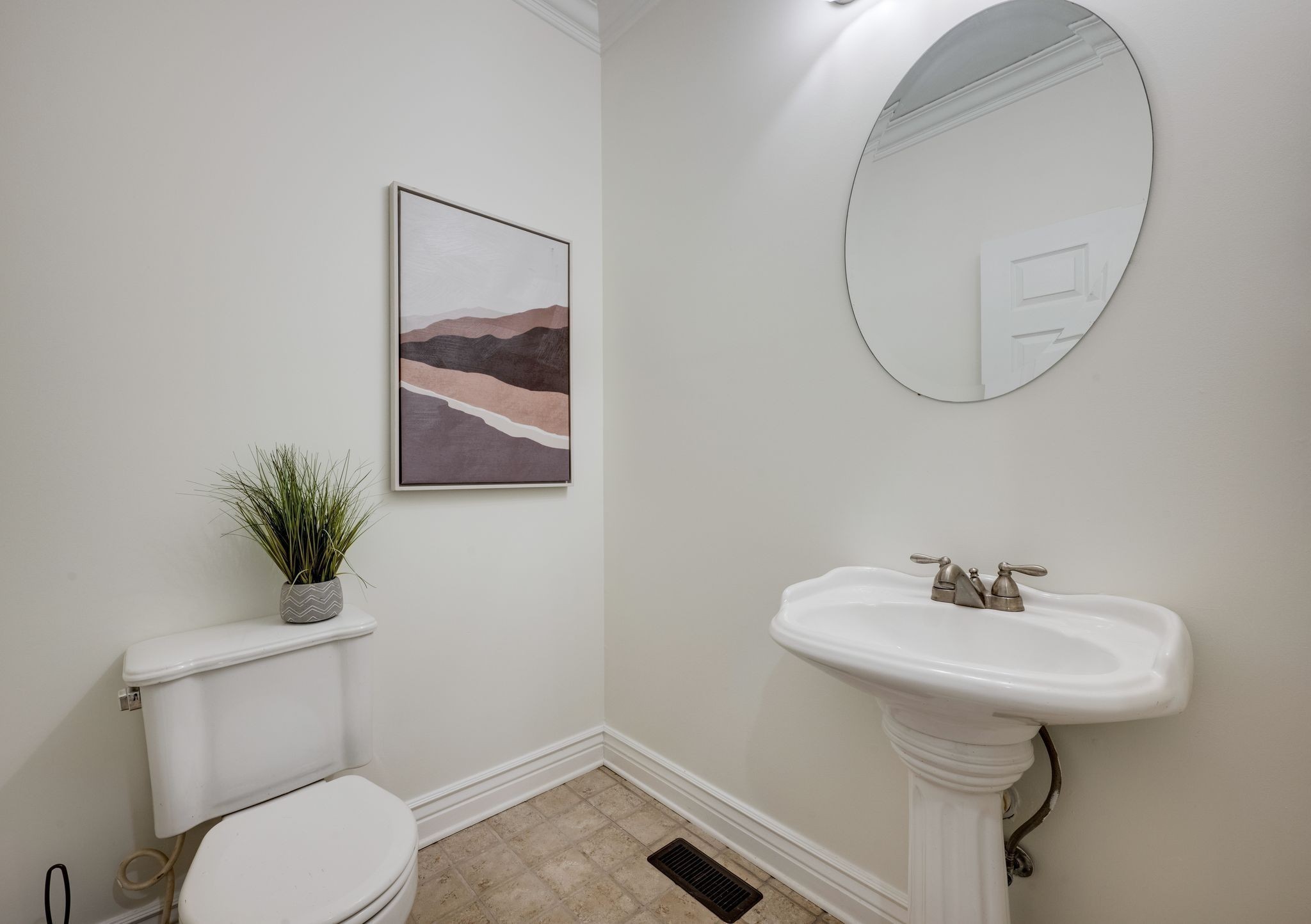 264 Fire Tower Road Dickson, TN 37055 - Photo 34 of 48 a bathroom with a toilet a sink and a mirror