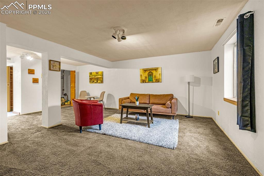 512 Harvest Moon Road Fountain, CO 80817 - Photo 21 of 41 a living room with furniture