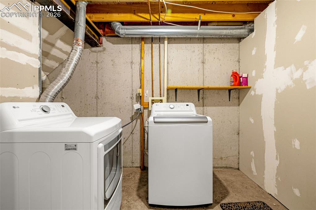 512 Harvest Moon Road Fountain, CO 80817 - Photo 25 of 41 a utility room with dryer and washer