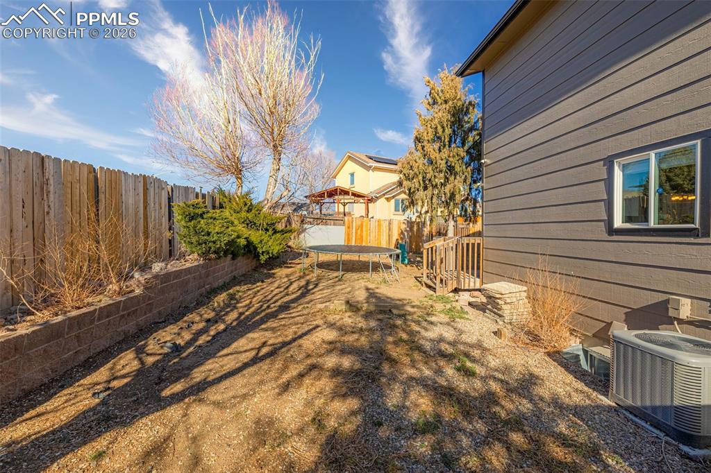 512 Harvest Moon Road Fountain, CO 80817 - Photo 30 of 41 a view of a backyard of the house