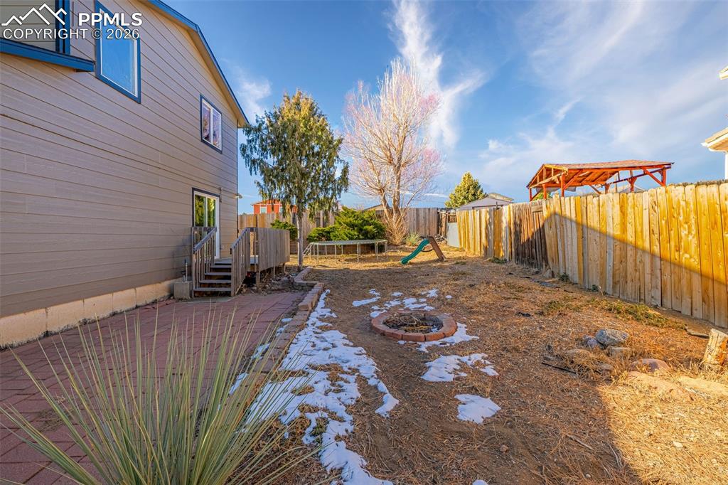 512 Harvest Moon Road Fountain, CO 80817 - Photo 31 of 41 a view of a backyard of the house