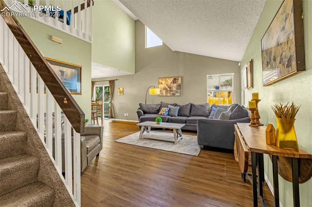 512 Harvest Moon Road Fountain, CO 80817 - Photo 4 of 41 a living room with furniture and a wooden floor