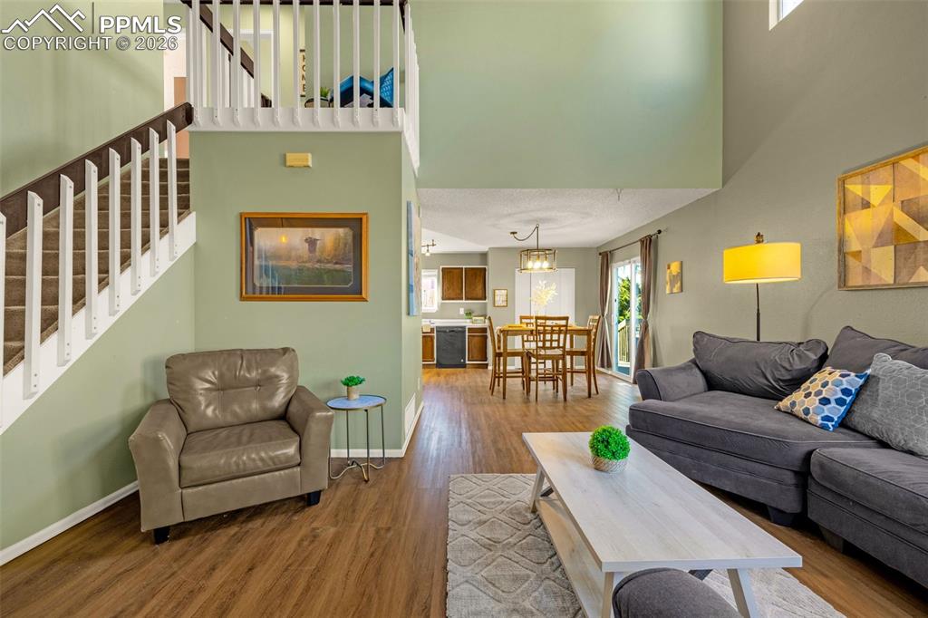 512 Harvest Moon Road Fountain, CO 80817 - Photo 5 of 41 a living room with furniture and a wooden floor