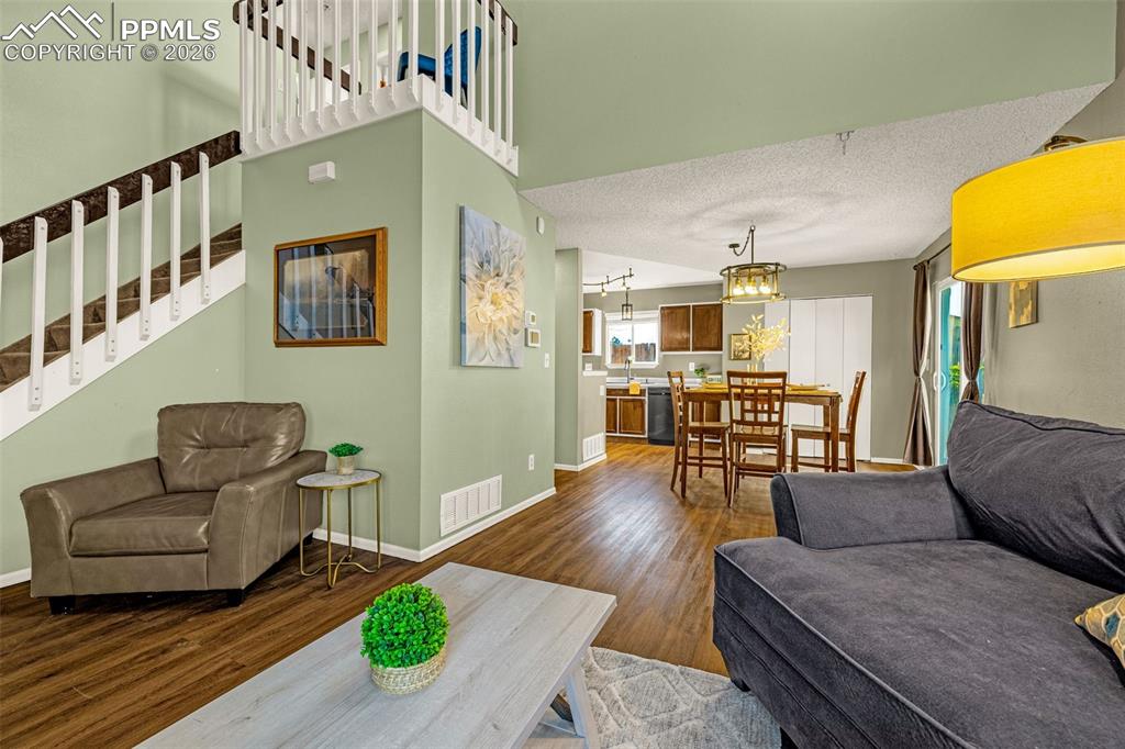 512 Harvest Moon Road Fountain, CO 80817 - Photo 6 of 41 a living room with furniture and wooden floor